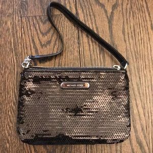 Michael Kors Black sequined wristlet. Never used.